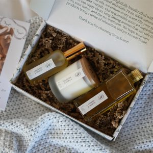 The Last Hour bedtime ritual box by Snug Scent, with its shower and bath oil, soy candle and pillow and room mist